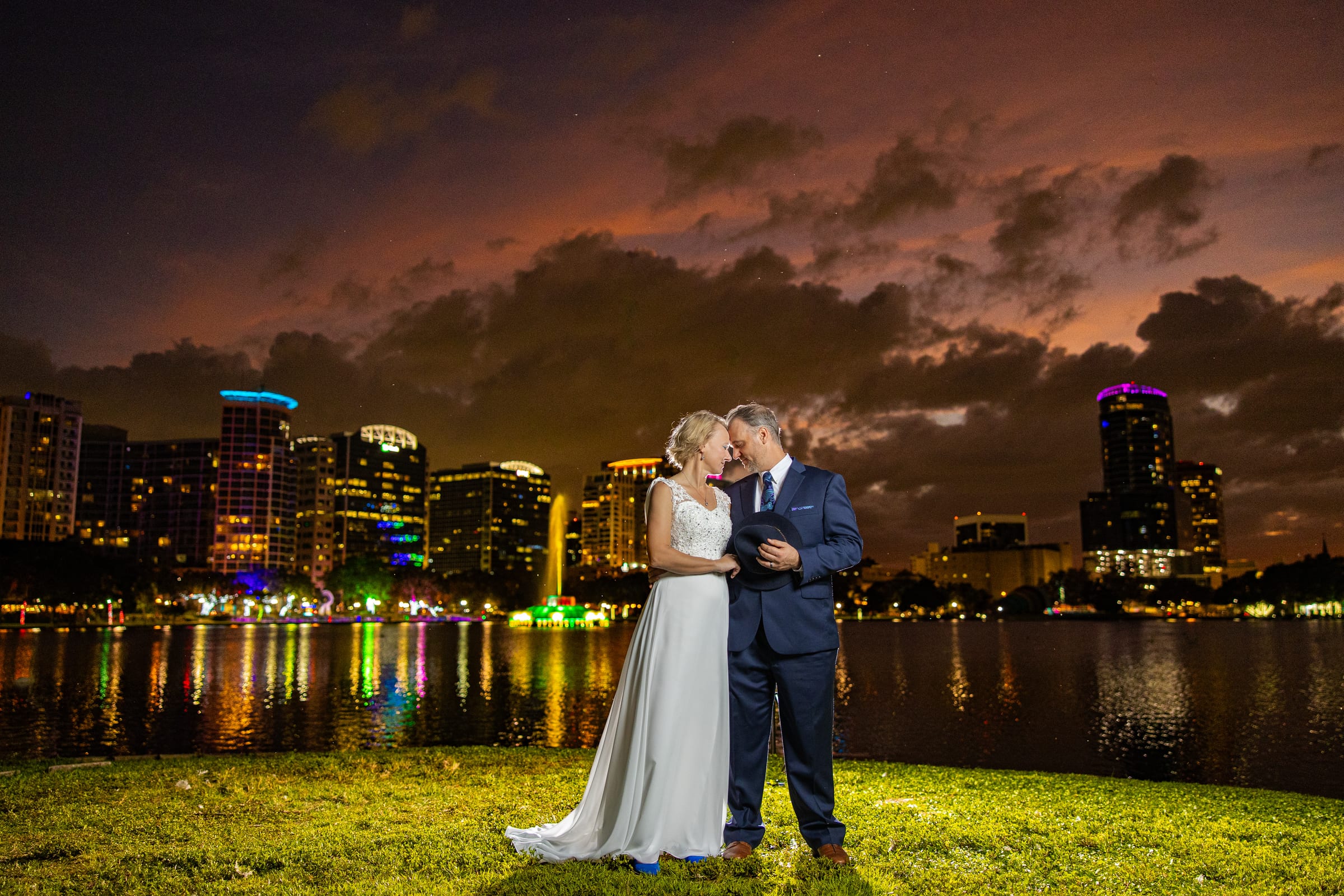 Wedding couple at Lake Eola sunset skyline, what's included in an Art Film